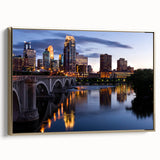 Framed canvas of Minneapolis landscape in gold and black tones, suitable for bedroom decor.