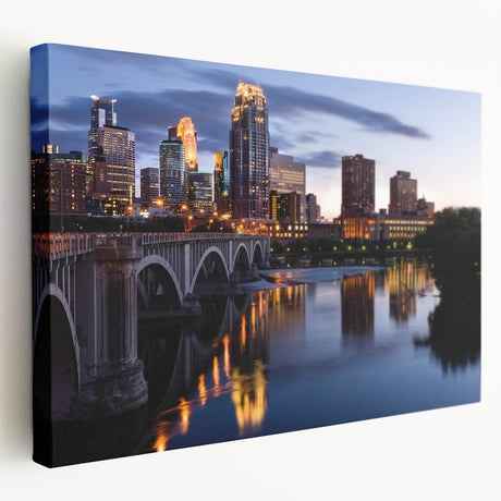 Large art print of the Minneapolis skyline in muted gray and blue tones on stretched canvas, ideal for kitchen wall decor.