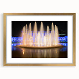 Extra large abstract art print of Kansas City skyline in muted gold and blue tones on a framed canvas.