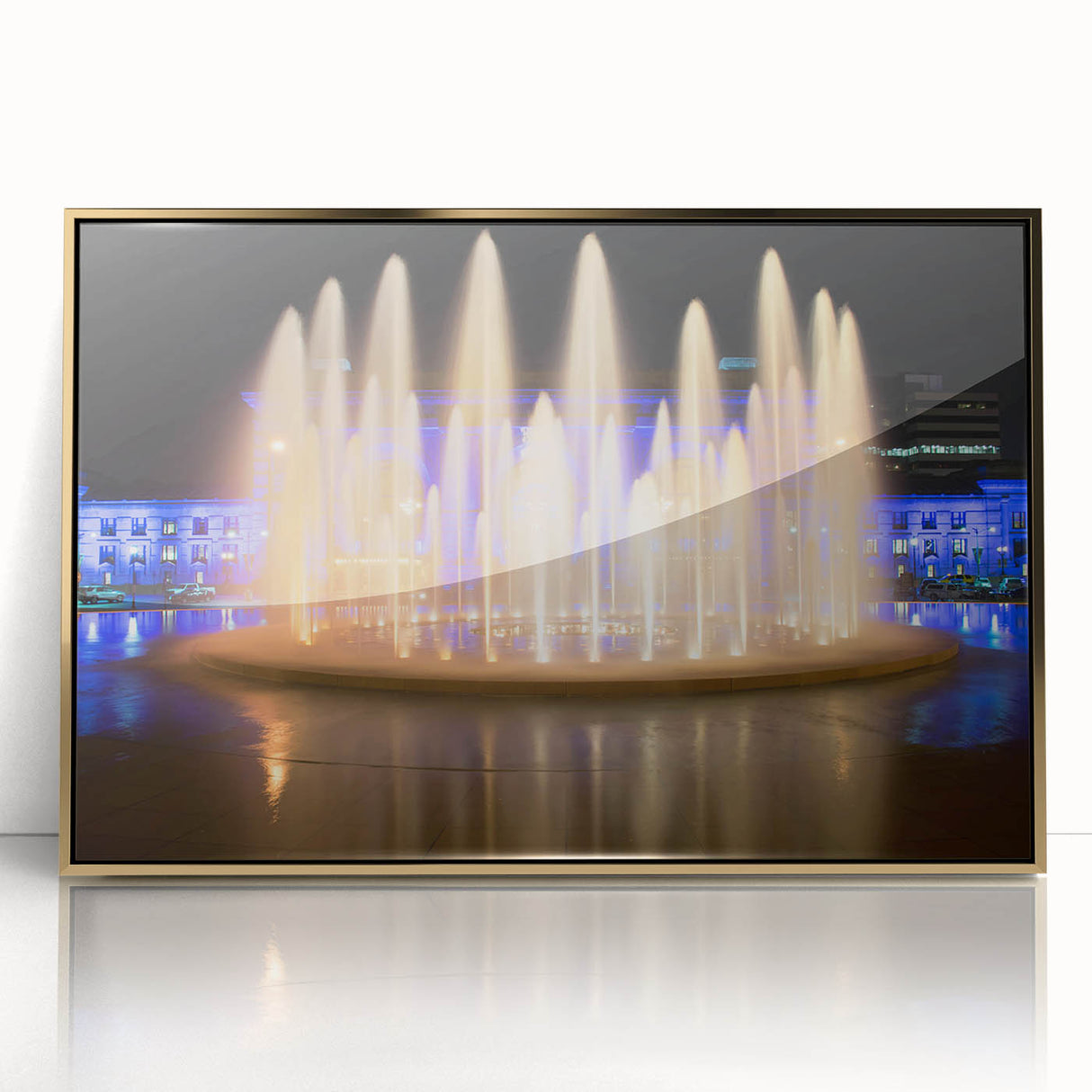 Acrylic print of Kansas City skyline in gold and black tones, framed, mid-century modernist style.