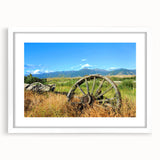 Abstract art print of Montana scenery in muted earth tones on a white-framed canvas.