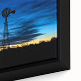 Close-up of black wall art featuring a textured Nebraska scenery on a framed canvas, with vibrant colors.