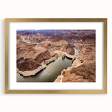 Extra large abstract art print of Hoover Dam, featuring textured grays and blues, in a gold frame.
