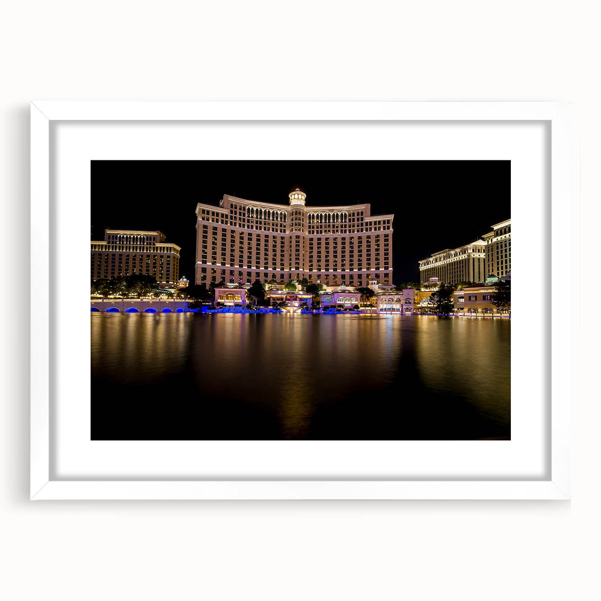 Abstract art print of Las Vegas skyline in muted grayscale on a white framed mat, suitable for dining room decor.