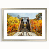 Textured art print depicting a serene New Hampshire landscape in muted greens and blues, framed in silver.