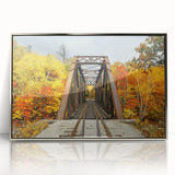 Mid-century modernist art depicting New Hampshire scenery in muted earth tones on a silver-framed acrylic print.