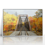 Art deco poster depicting New Hampshire scenery in muted earth tones, framed in white acrylic.