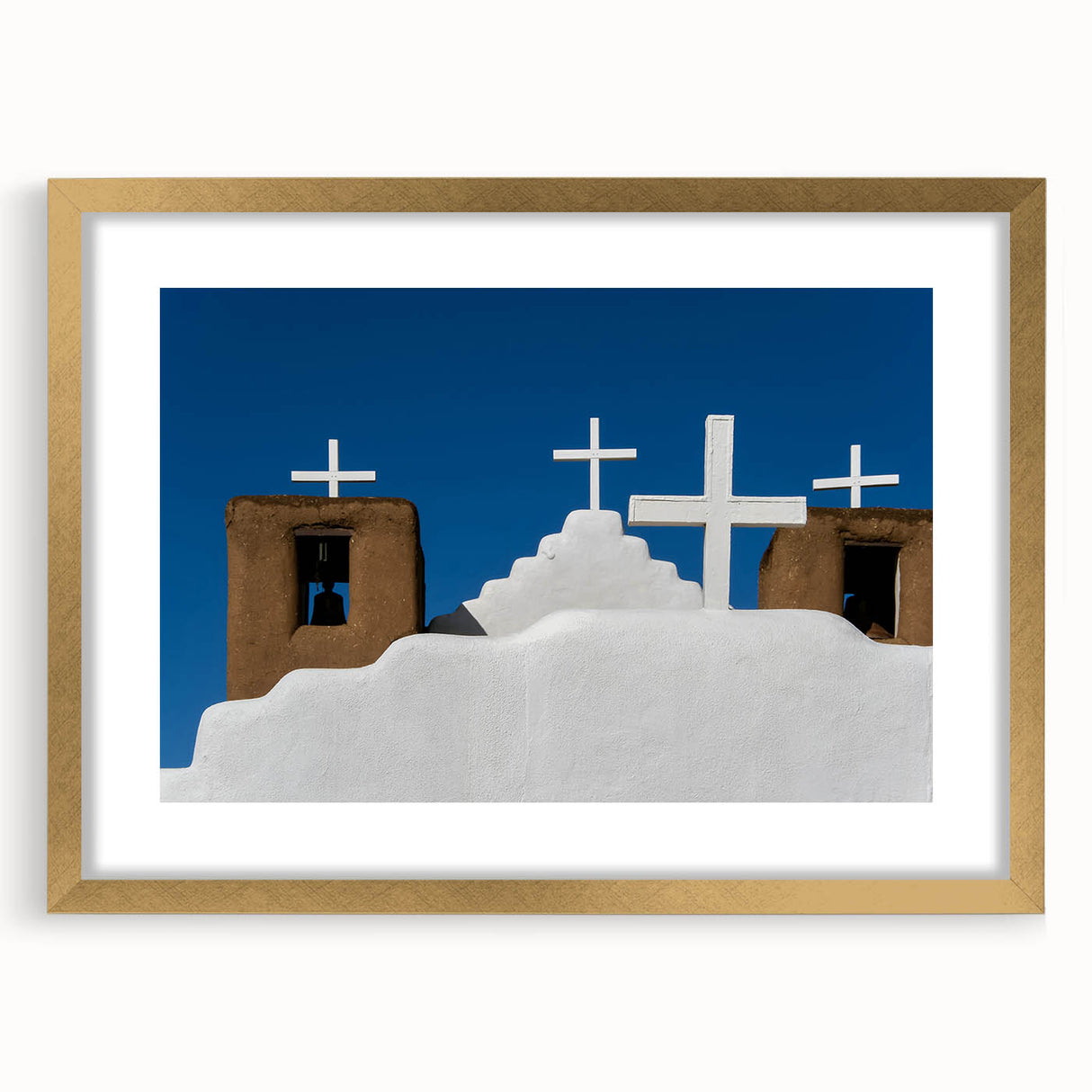 Extra large abstract art print of a textured New Mexico scenery in muted earth tones, framed in gold.