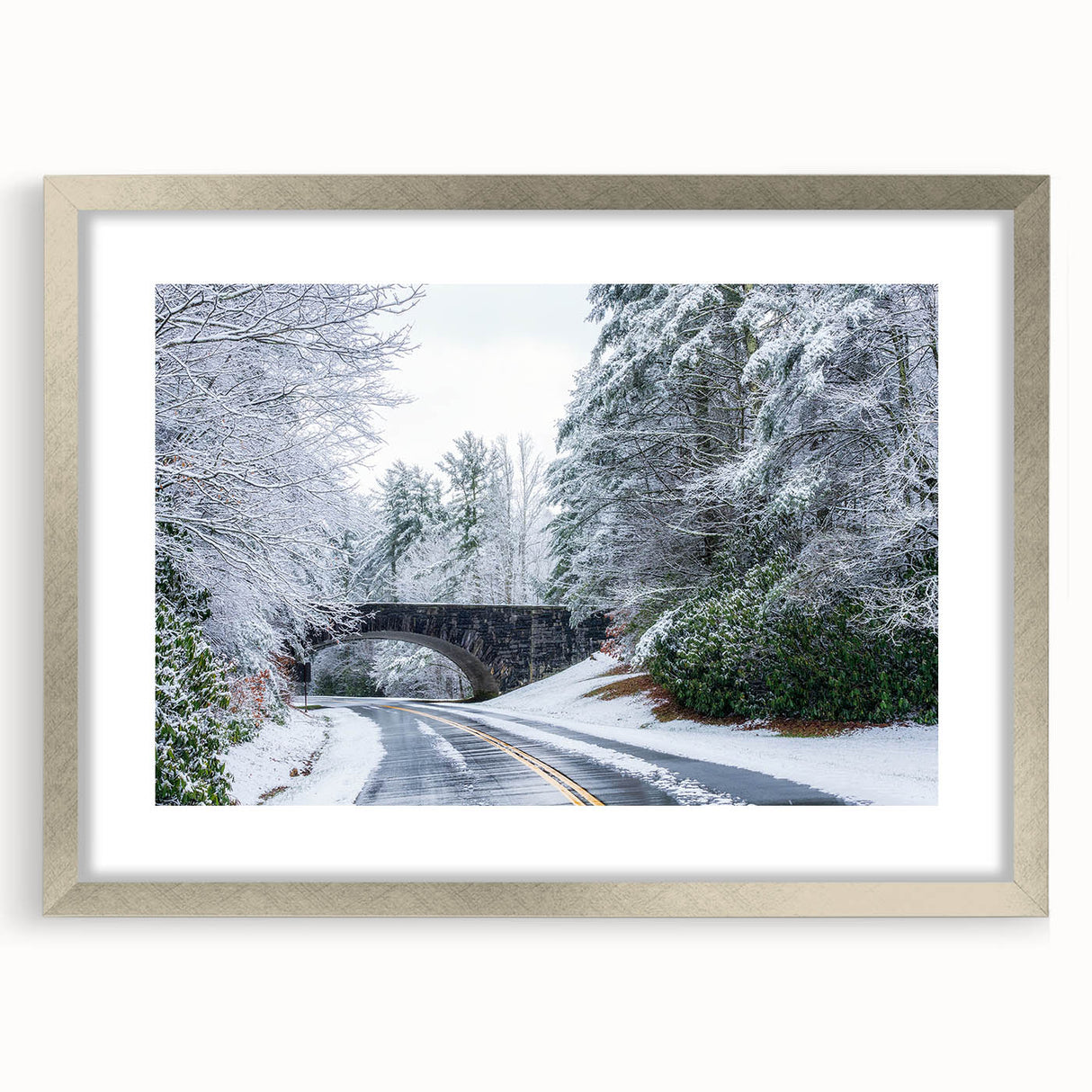 Textured art depicting the Blue Ridge Mountains in muted blues and grays on a framed silver mat, suitable for bedroom decor.