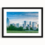 Abstract art print of Charlotte skyline with vibrant, colorful textures on a large framed canvas.