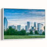 Vintage poster art of Charlotte skyline on framed canvas, featuring colorful art in extra large format.
