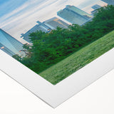 Art deco poster of Charlotte skyline in muted gold and blue tones on rolled canvas, suitable for dining room wall art.