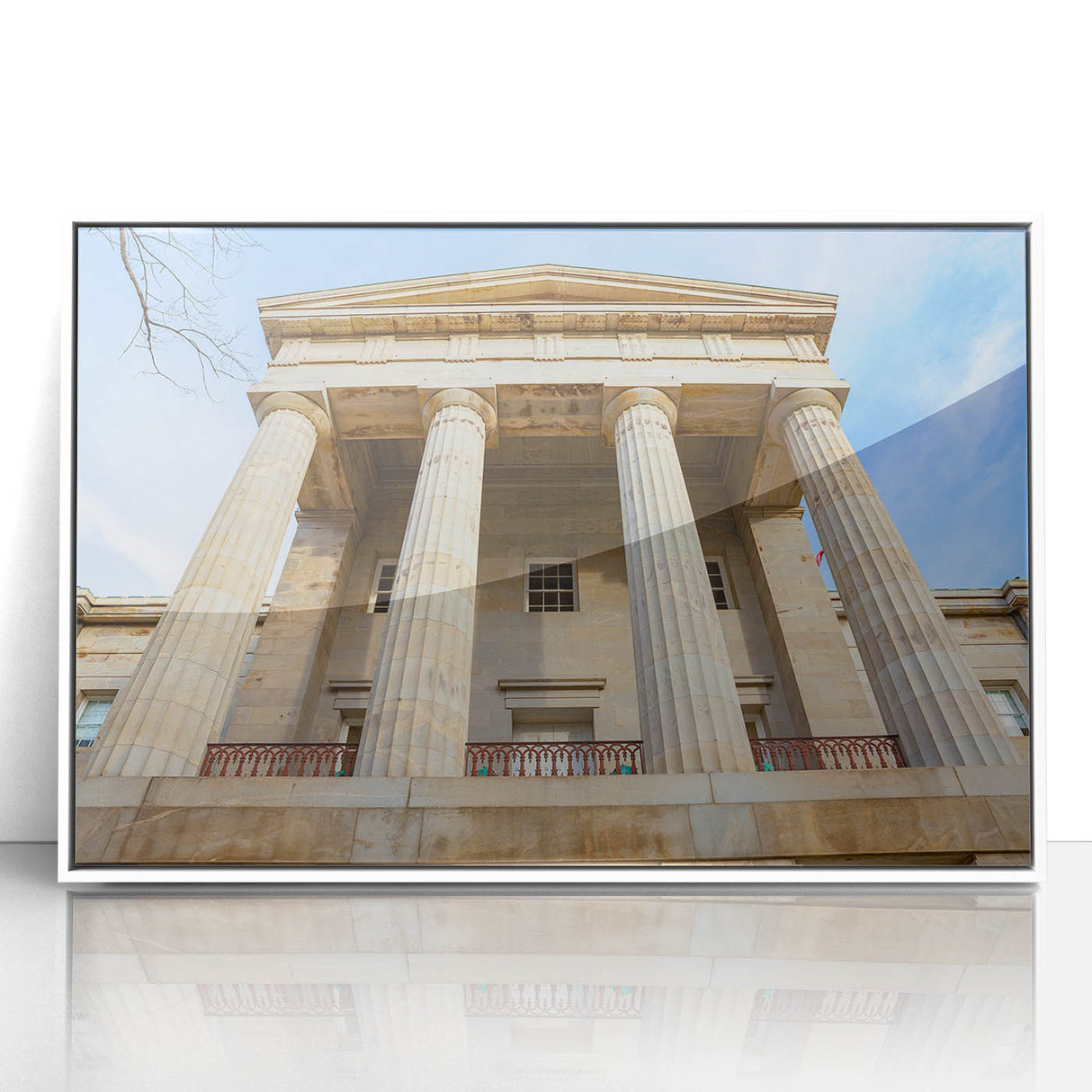 Acrylic print of Raleigh, North Carolina skyline in art deco style with muted blue and white colors.