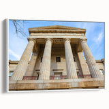 Vintage poster art of Raleigh, North Carolina, featuring colorful art on a framed canvas, ideal for living room decor.