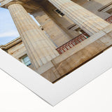 Art deco poster of Raleigh skyline in muted gray and blue tones on rolled canvas, suitable for dining room wall art.