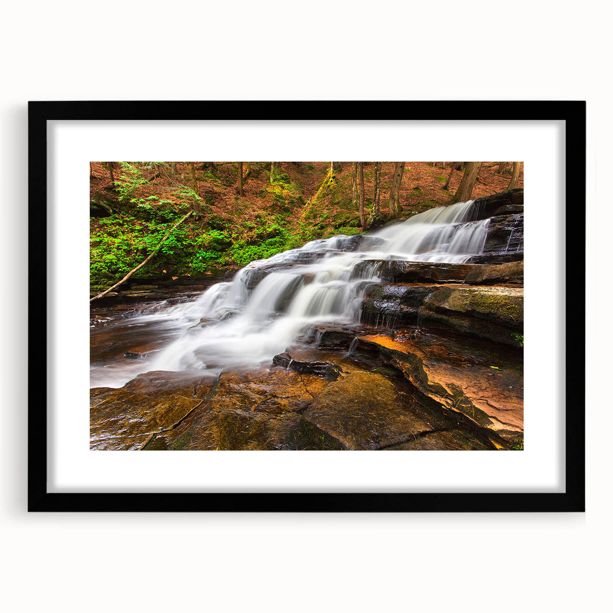 Colorful abstract art print of Adirondack scenery in textured style, framed in black.