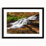 Colorful abstract art print of Adirondack scenery in textured style, framed in black.