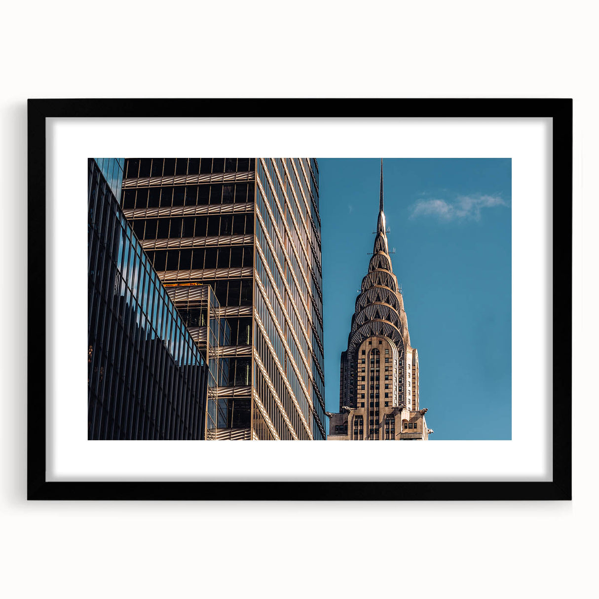 Abstract art print of the Chrysler Building in vibrant colors, textured on a large framed canvas.