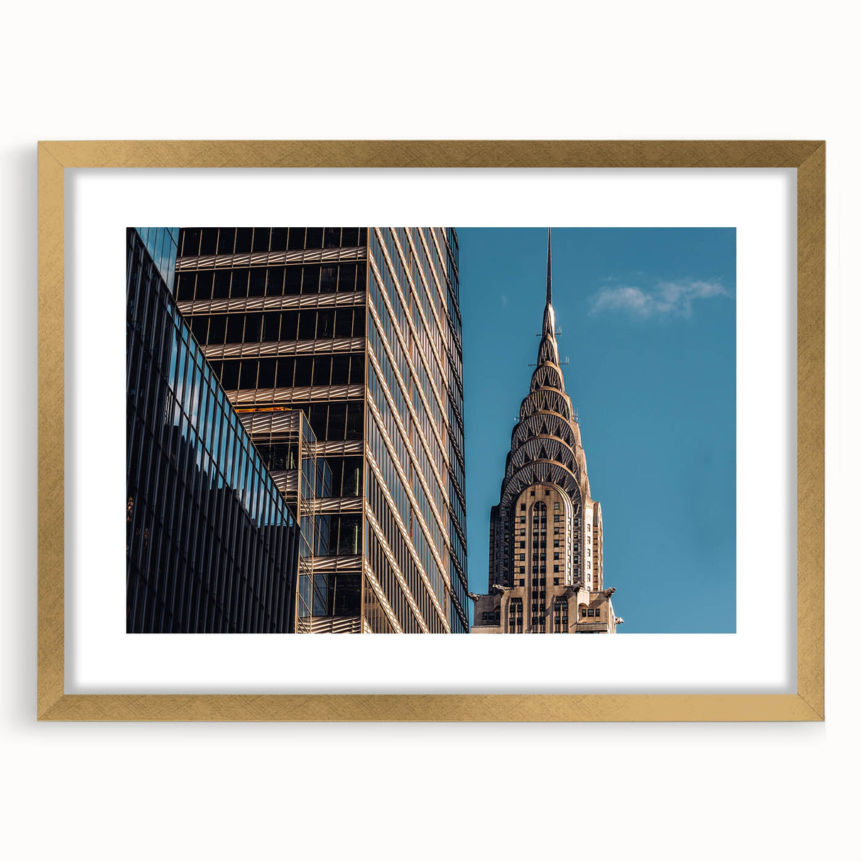 Extra large abstract art print of the Chrysler Building in textured gold and black tones on a framed canvas.