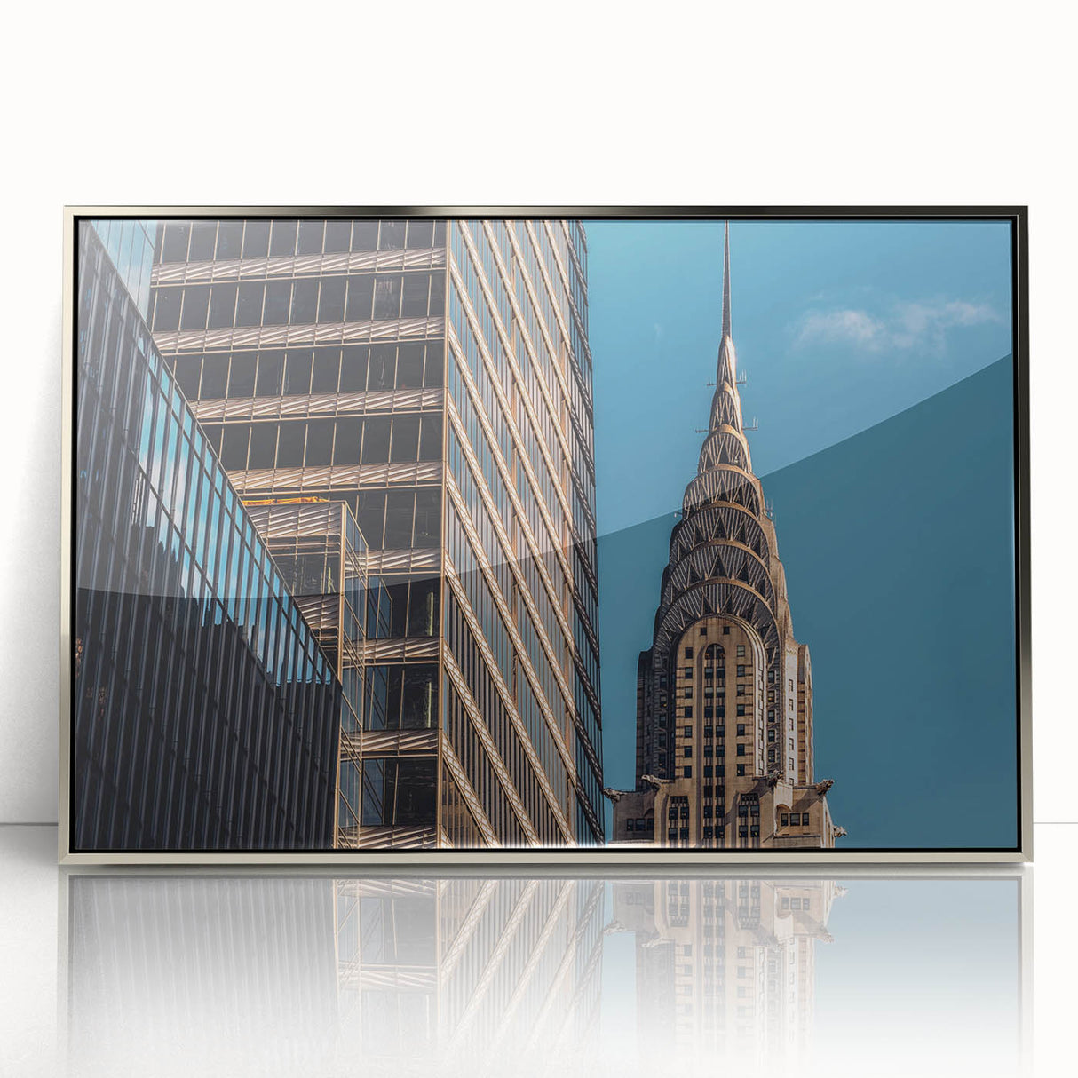 Mid-century modernist art of the Chrysler Building in silver tones on a framed acrylic, suitable for nursery wall art.