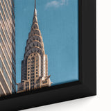 Close-up of a textured black wall art featuring the Chrysler Building in colorful, extra large framed canvas format.
