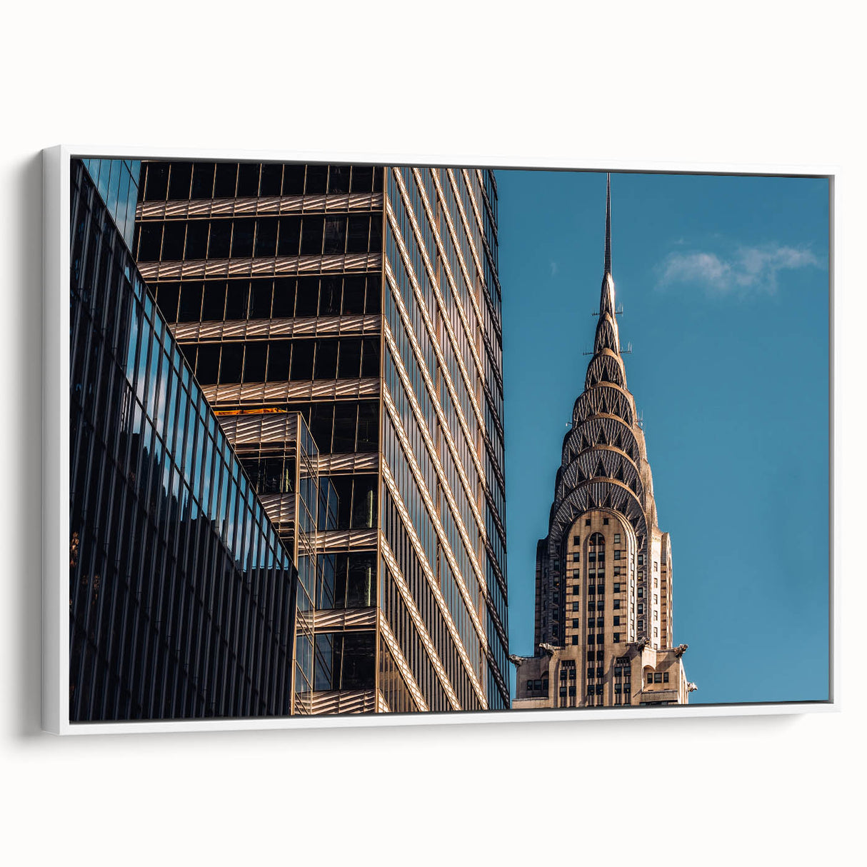 Vintage poster art of the Chrysler Building, featuring a monochrome palette with colorful accents on framed canvas.