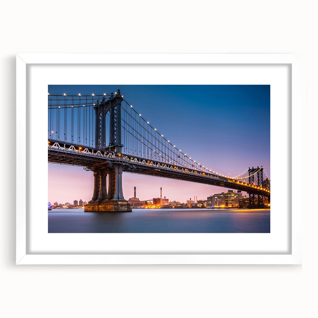 Abstract art print of the Manhattan Bridge in muted gray and blue tones, framed in white, ideal for dining room decor.