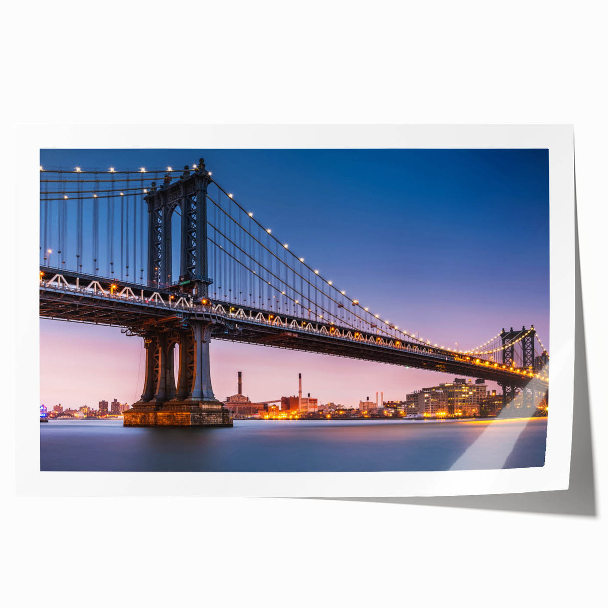Rolled print of Manhattan Bridge in muted gray tones, ideal for art wall in dining room.