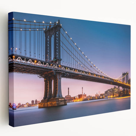 Side view of a large stretched canvas featuring the Manhattan Bridge in muted gray and blue tones.