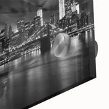 Large abstract depiction of Manhattan skyline in muted gray and blue tones on acrylic glass, suitable for dining room art.