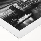 Art deco poster of Manhattan skyline in monochrome shades on rolled canvas, suitable for dining room wall.