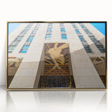 Acrylic print of New York City from Rockefeller Center in gold tones, framed, mid-century modernist style.
