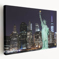 Side view of a large canvas print featuring the Statue of Liberty, set against a muted blue sky, ideal for kitchen wall art.