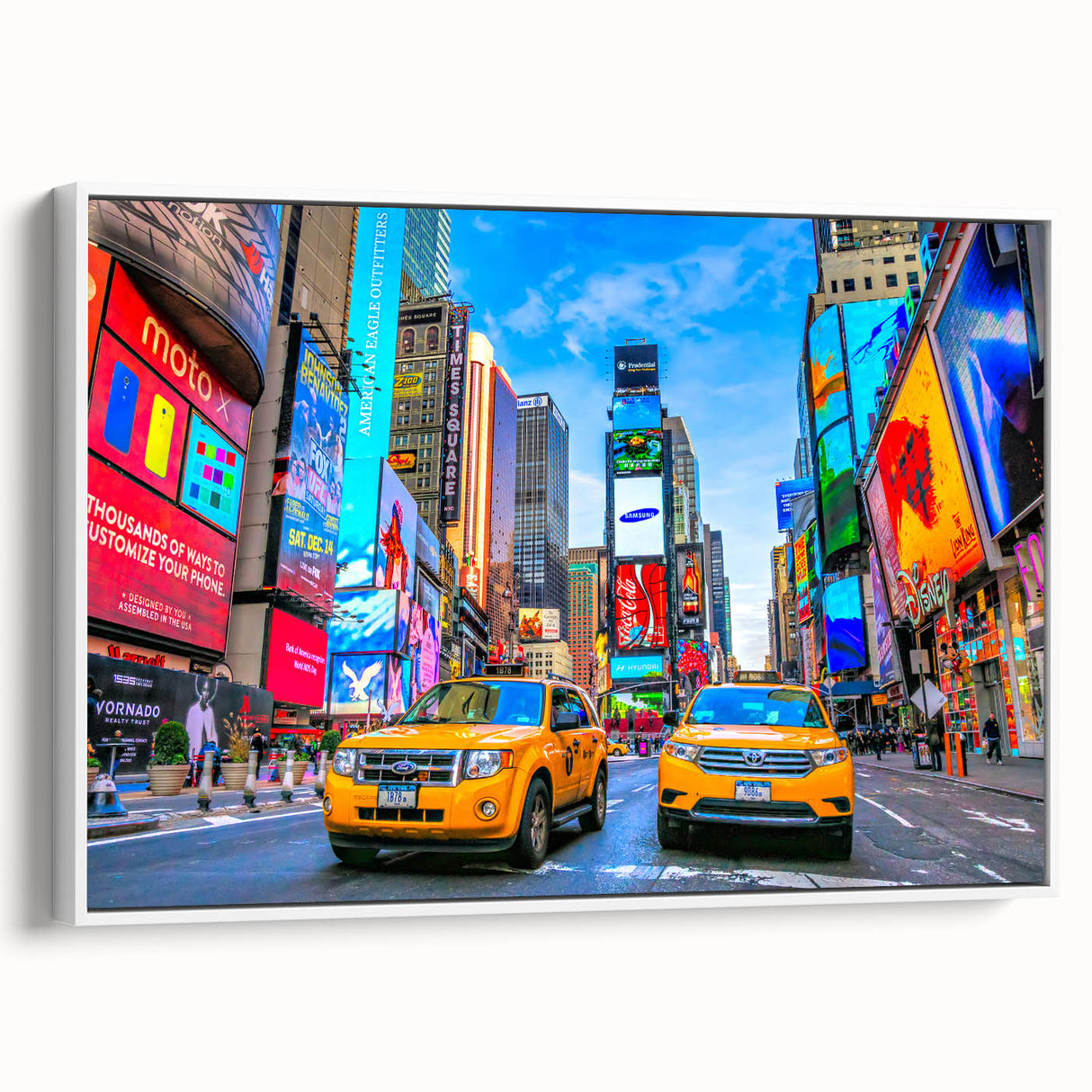 Framed canvas of vintage poster art depicting Times Square, featuring a mix of colorful art on black background.