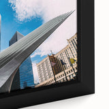 Close-up of extra large framed canvas featuring a textured depiction of NYC's Trade Center in black with colorful art…