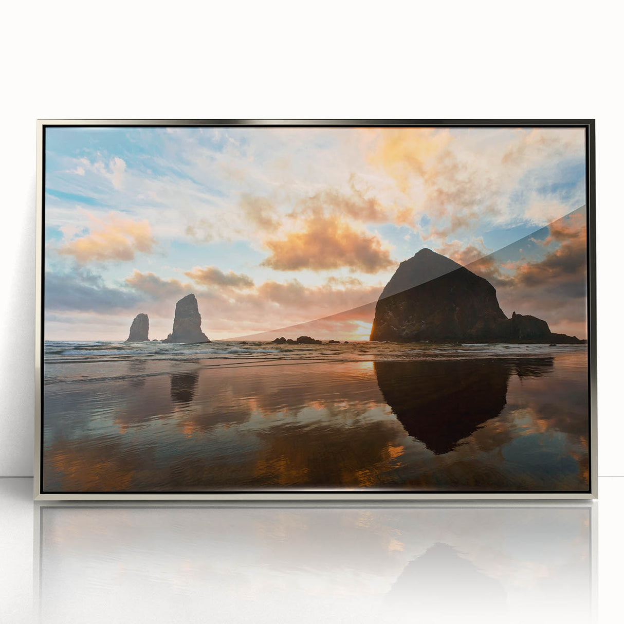 Framed acrylic print of Cannon Beach, Oregon, with muted earth tones in a mid-century modernist style.