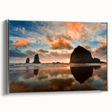 Framed canvas depicting Cannon Beach, Oregon, with muted gray and vibrant blue tones, suitable for living room decor.