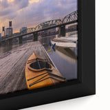 Extra large framed canvas of a textured Portland, Oregon skyline in black with colorful accents, ideal for living room decor.