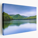 Side view of a stretched canvas featuring a serene Pennsylvania landscape in muted green and blue tones.
