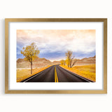Extra large abstract art print of South Dakota Badlands in textured gold frame, displaying earthy tones.