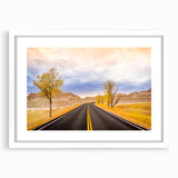 Abstract art print of South Dakota Badlands in muted earth tones on a framed white mat.