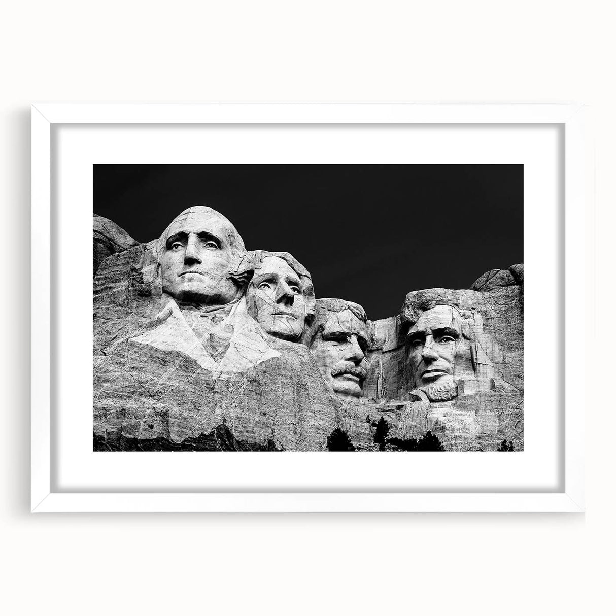 Abstract art print of Mt. Rushmore in muted earth tones on a white framed poster, suitable for bedroom or dining room decor.