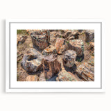 Abstract art print of South Dakota scenery in muted earth tones on a white-framed canvas.