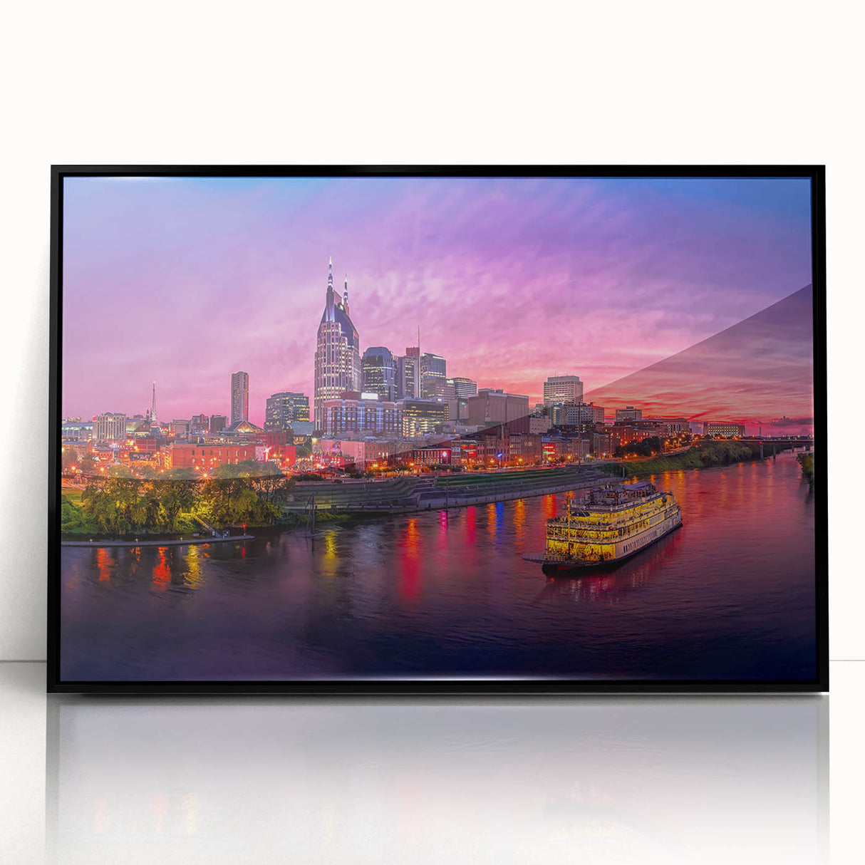 Large abstract wall art featuring Nashville skyline in muted gray and blue tones on a framed acrylic.