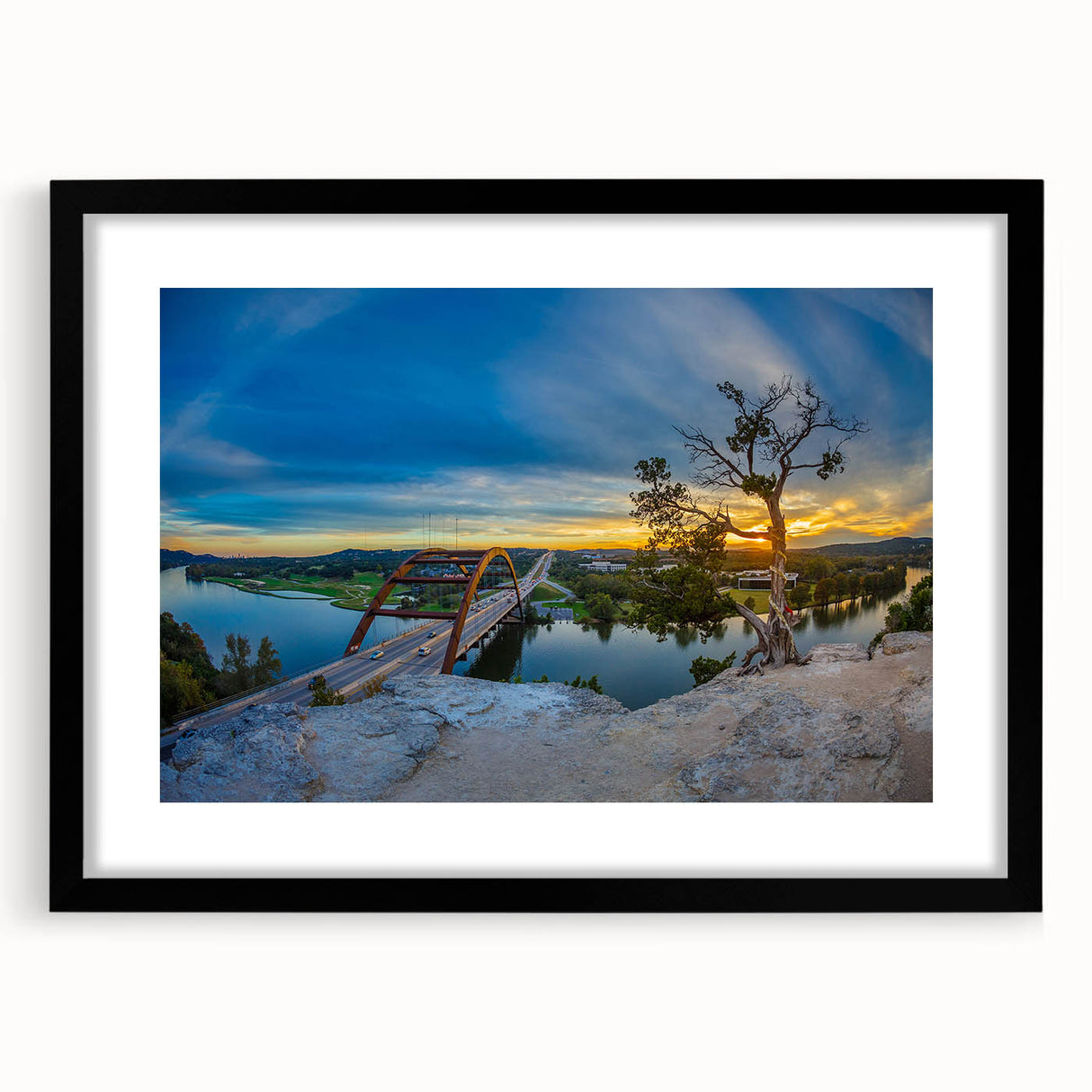 Extra large abstract art print of Austin skyline in colorful, textured hues on a black framed canvas.