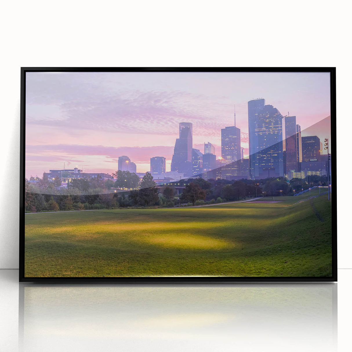 Large abstract wall art of Houston skyline in muted gray and blue tones on a framed acrylic.