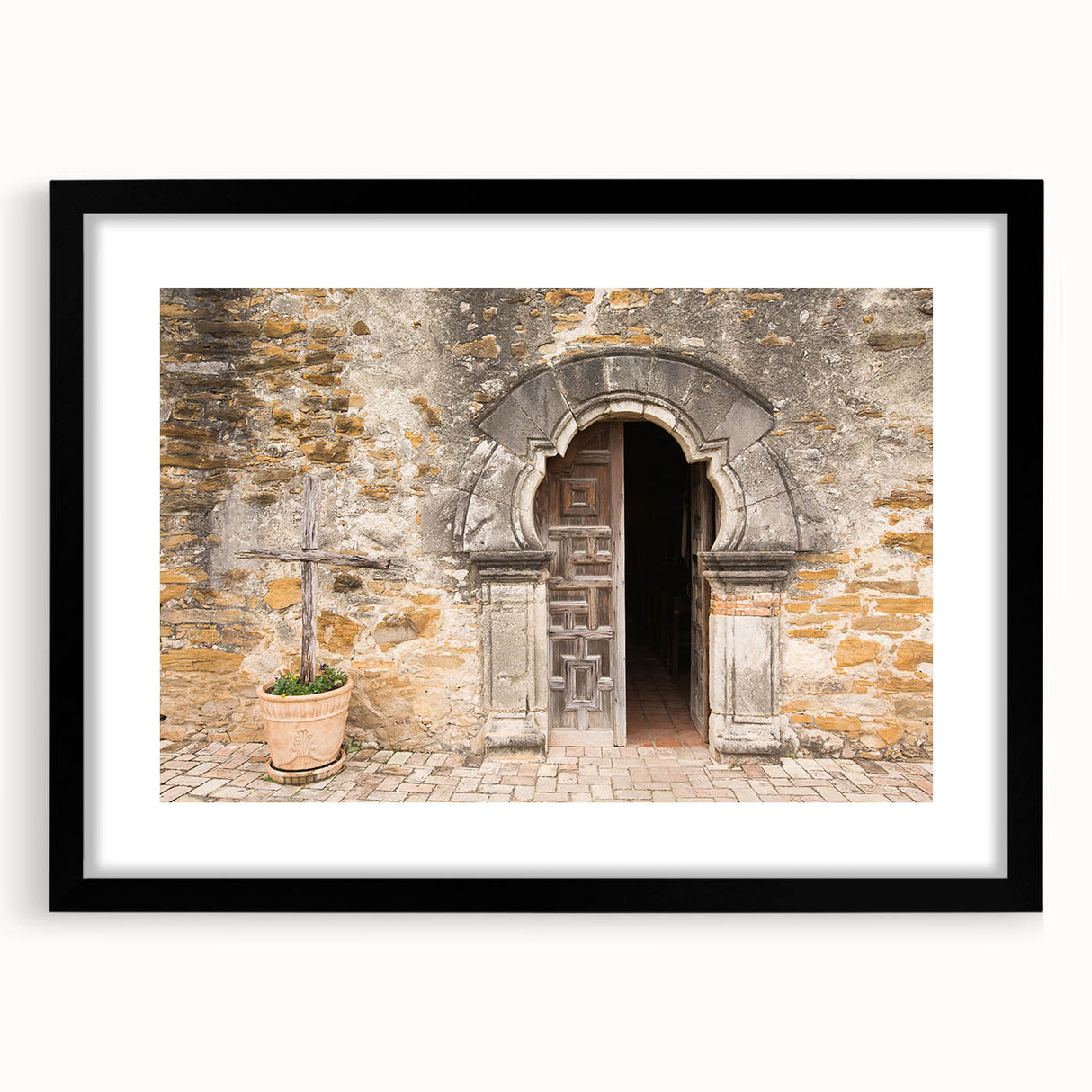 Abstract art print of San Antonio skyline in colorful, textured brush strokes on a large black-framed canvas.