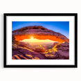 Extra large abstract art print of Arches National Park in vibrant red and orange hues on a textured canvas.