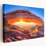 Arches National Park landscape on large stretched canvas, featuring earthy red and orange tones.