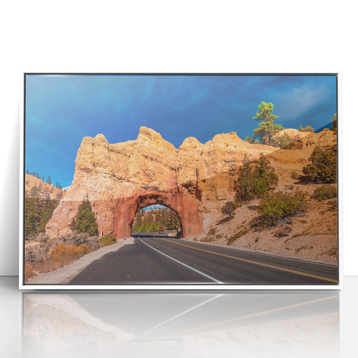 Acrylic print of Bryce Canyon with vivid orange and red hues, framed in white, ideal for modern art wall decor.